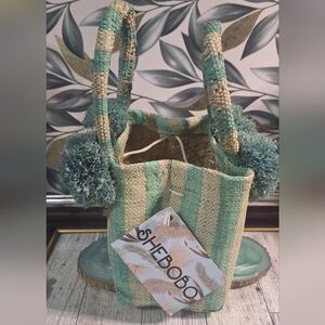 Shebobo Straw/Rafia Mint Green and Natural Striped Woven Mini Tote with Pom-Poms
